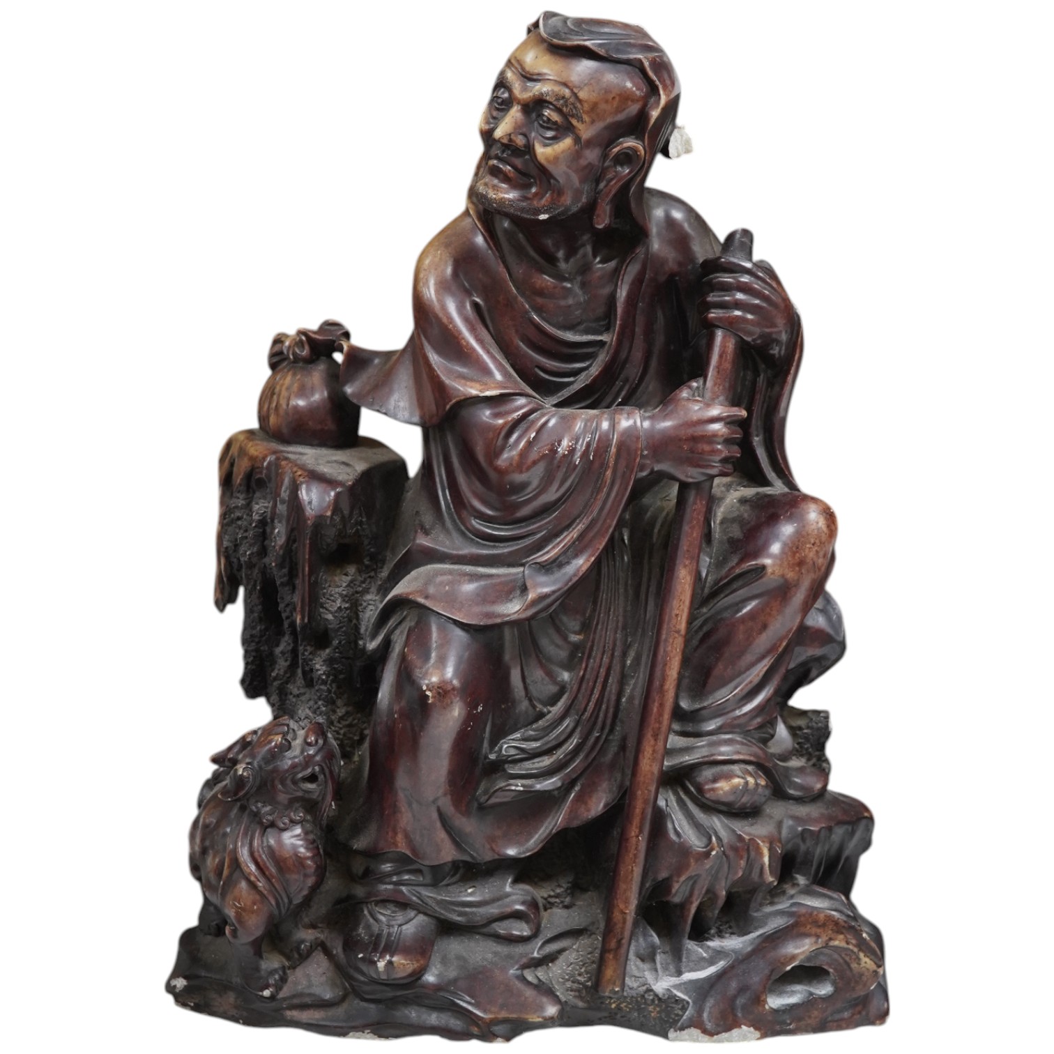 A large Chinese soapstone figure of an elder, 50cm high